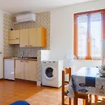 Lägenhet Baia Del Tramonto